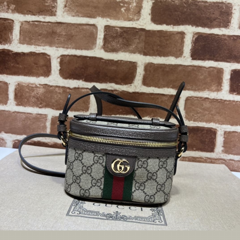 G*u*i cosmetic bags